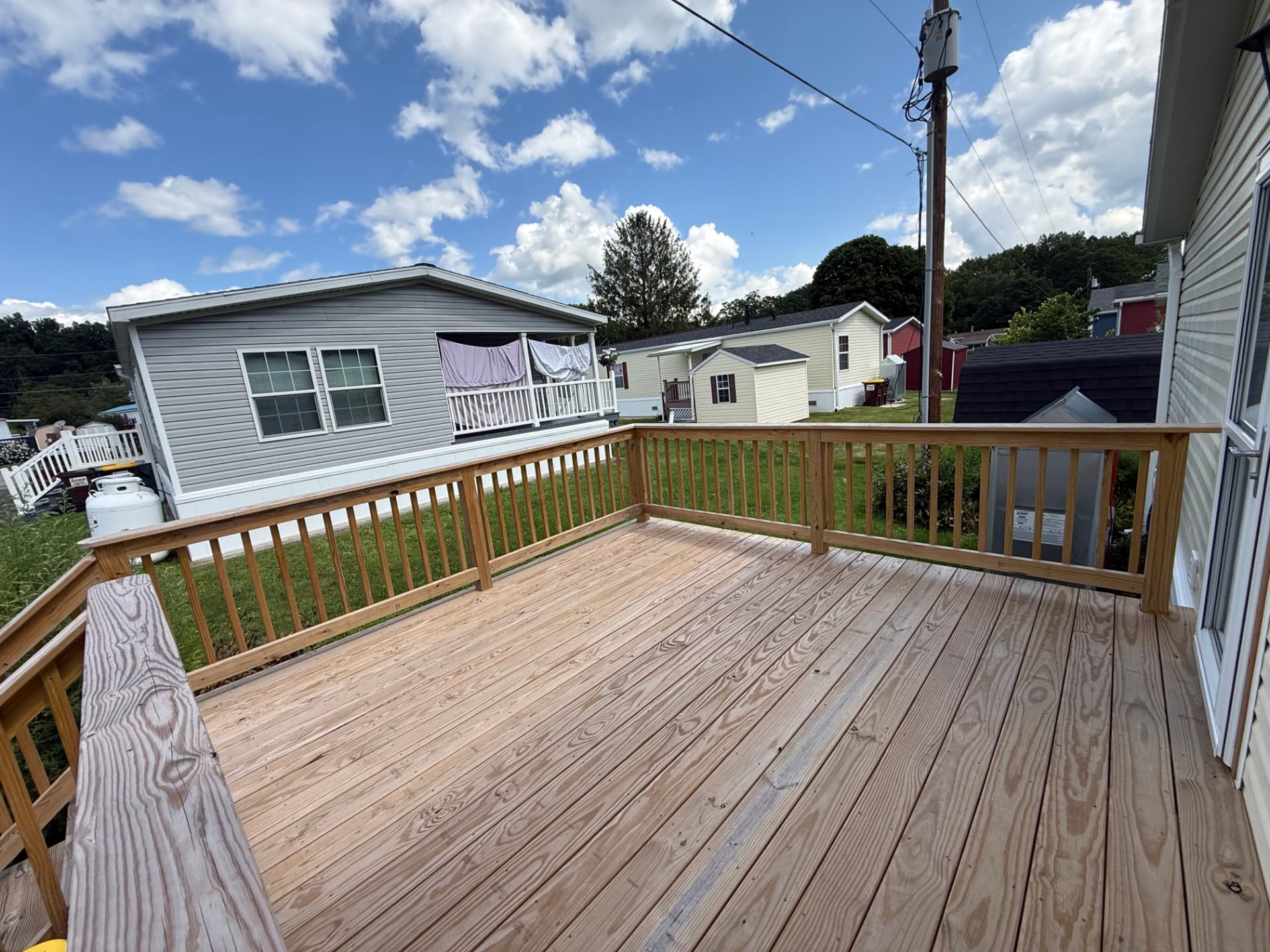 The wood deck at 40 Michael looking out over the lawn