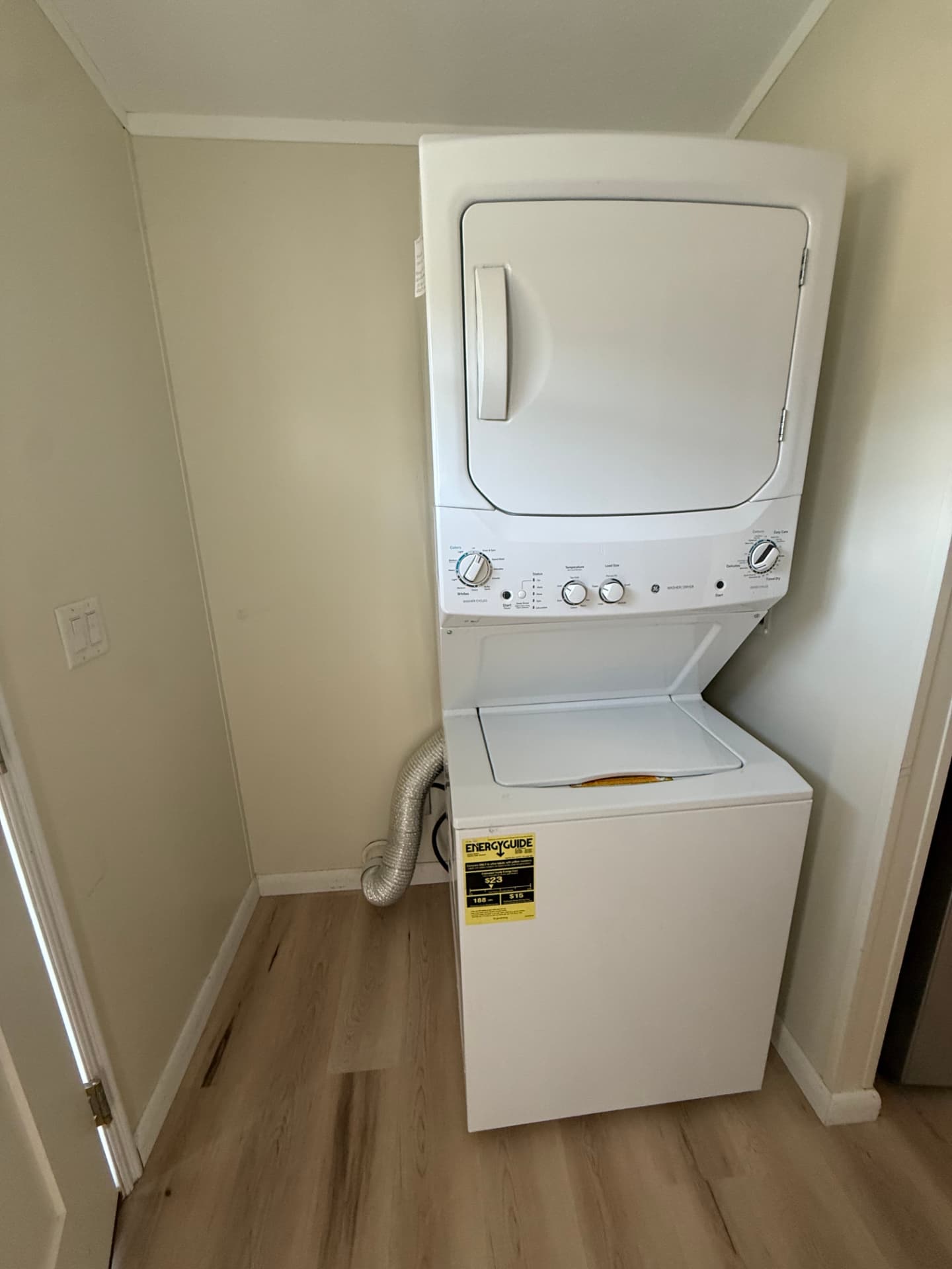 Laundry closet at 15 Kevin with stacked washer and dryer