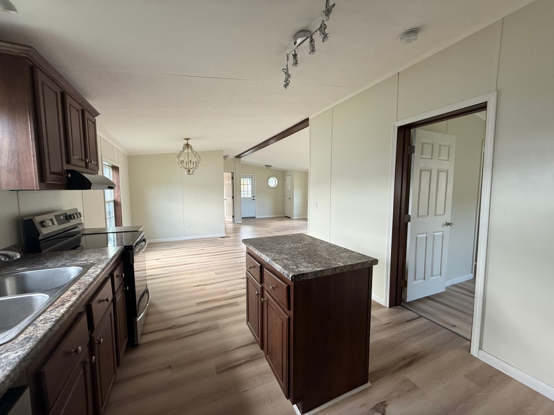 Kitchen island and open sightline to the living area at 15 Kevin
