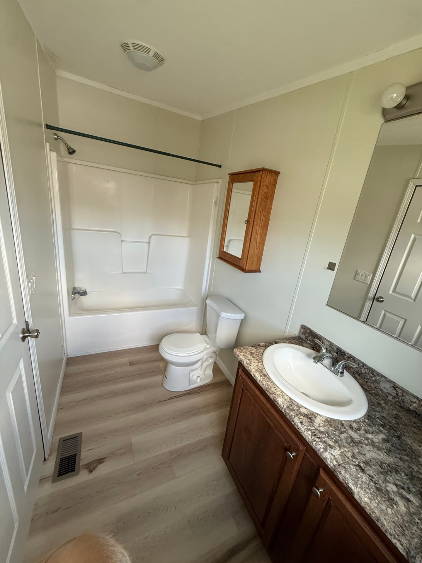 Full bathroom at 15 Kevin with tub-shower and vanity