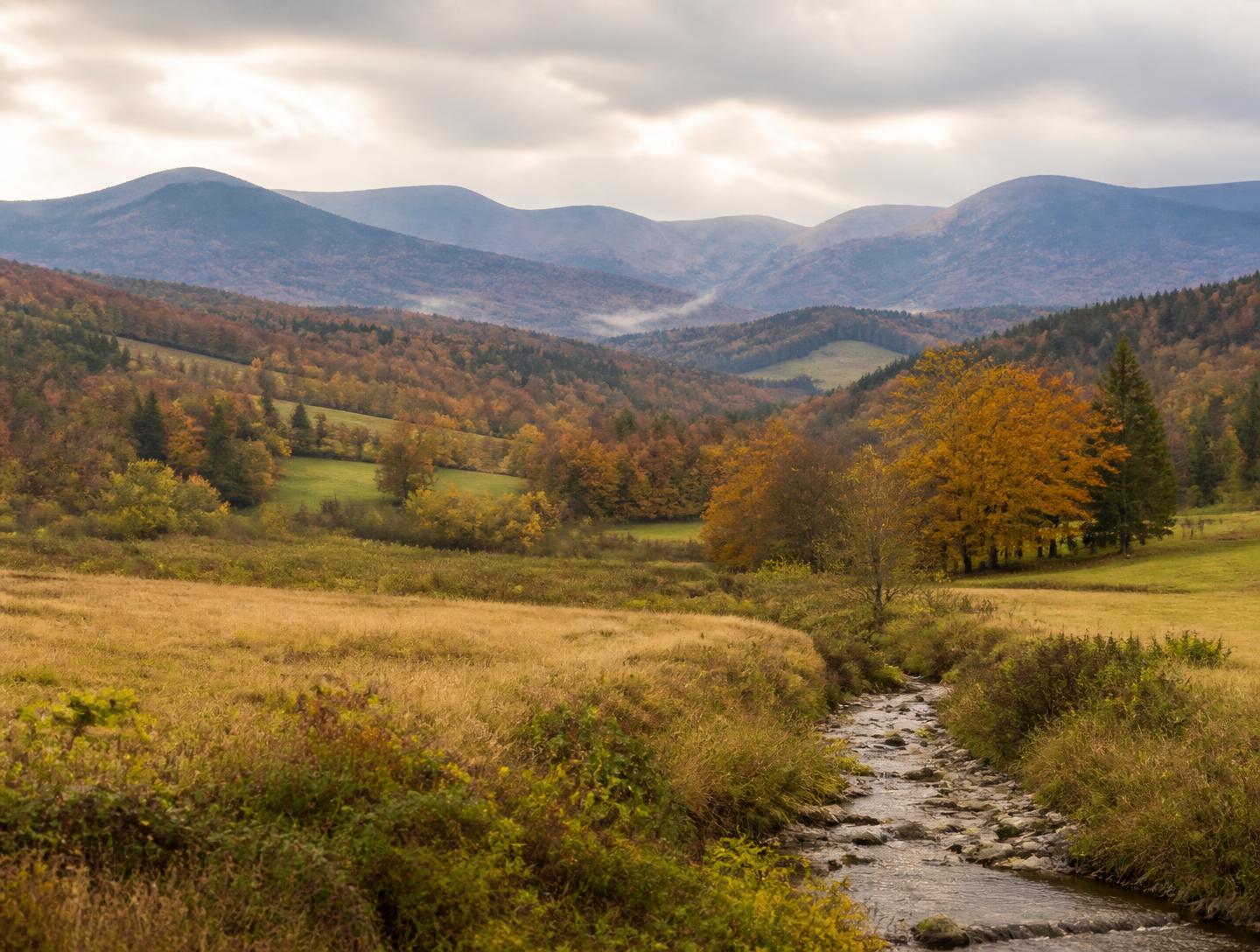 Representative Catskills landscape: mountains and farmland under autumn colour